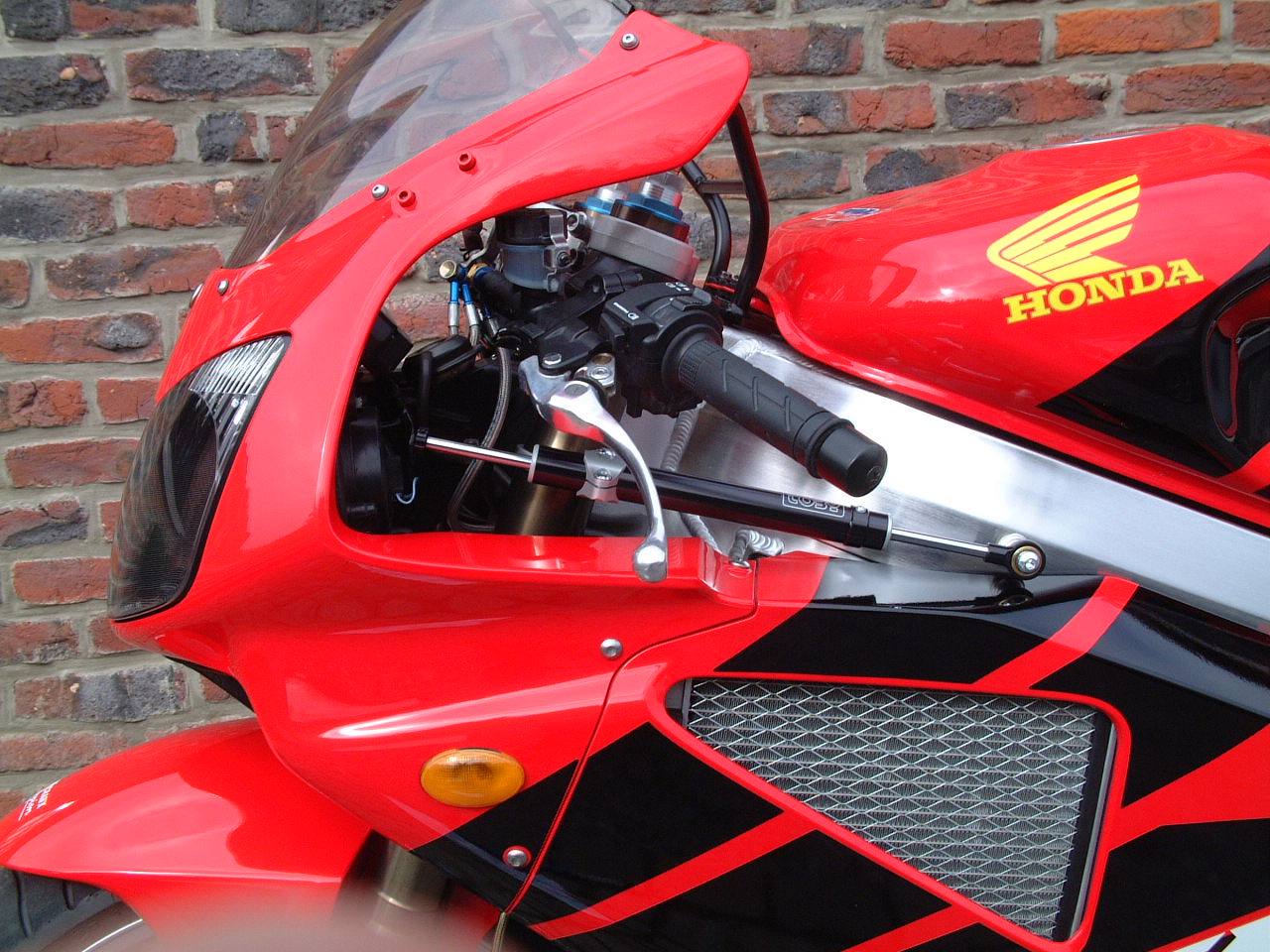 HO10.03 AMORTECEDOR DIRECAO VTR1000SP-1 RAC 00/04