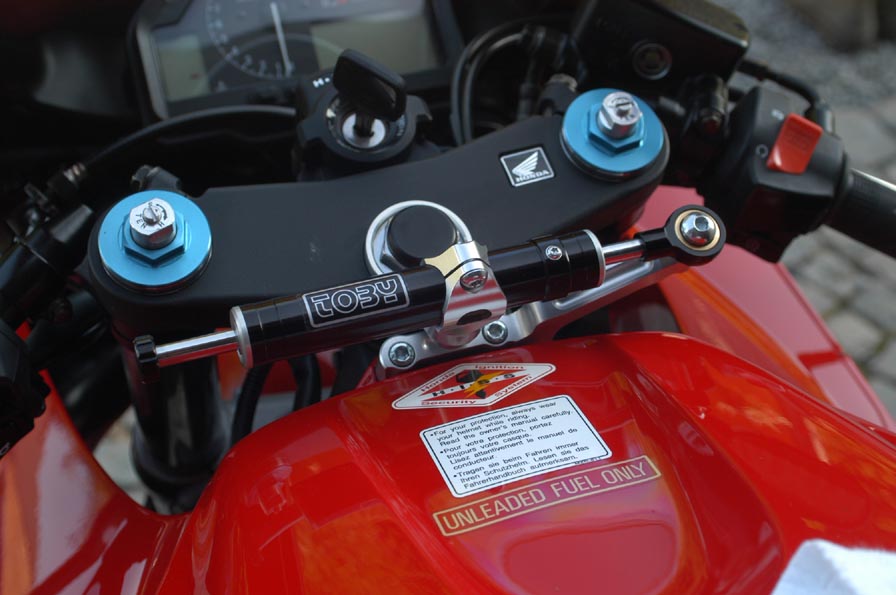 HO06.09 AMORTECEDOR DIRECAO CBR600RR-03/04