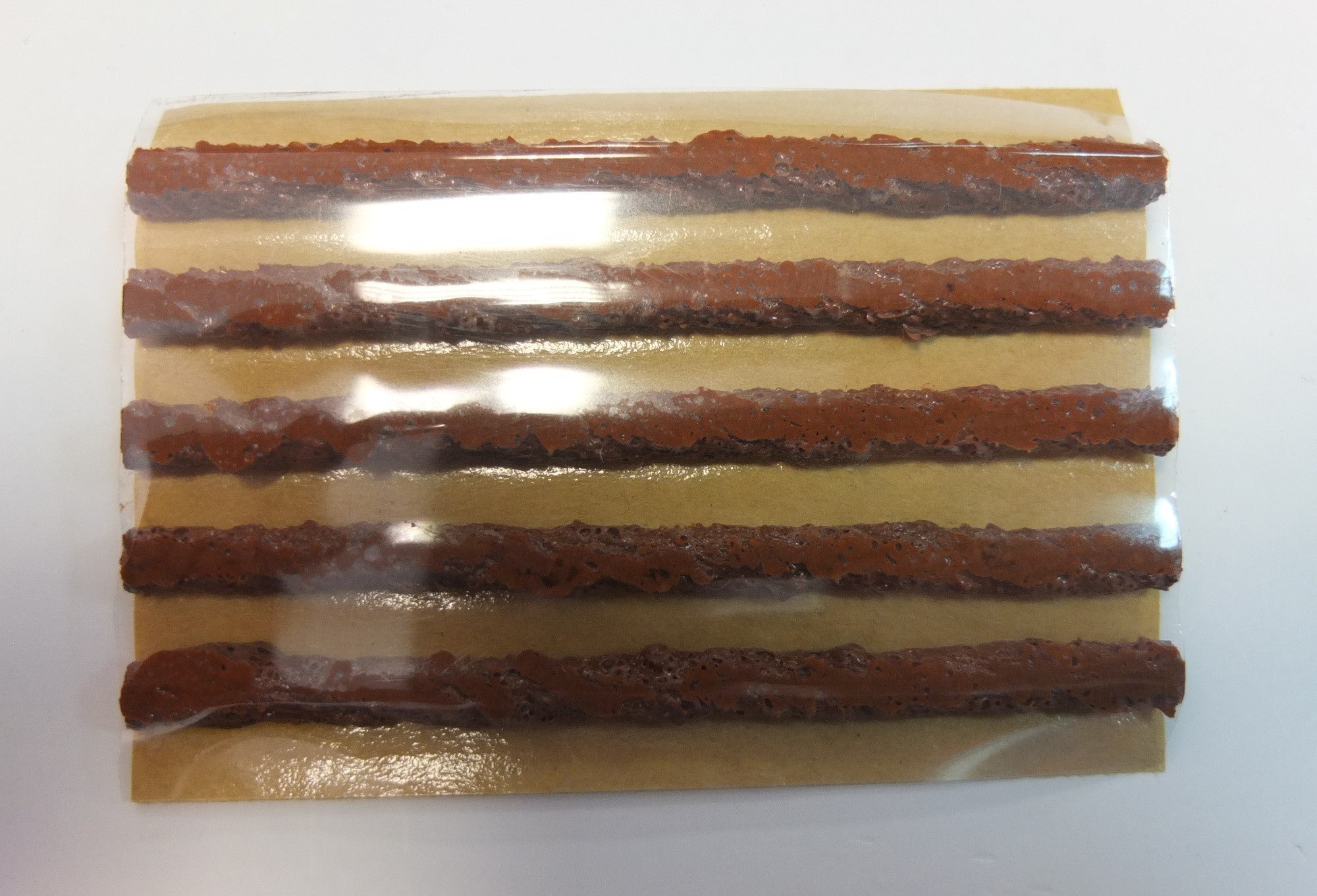 TRIPA TAPA FUROS 4" CASTANHA (50 PCS)