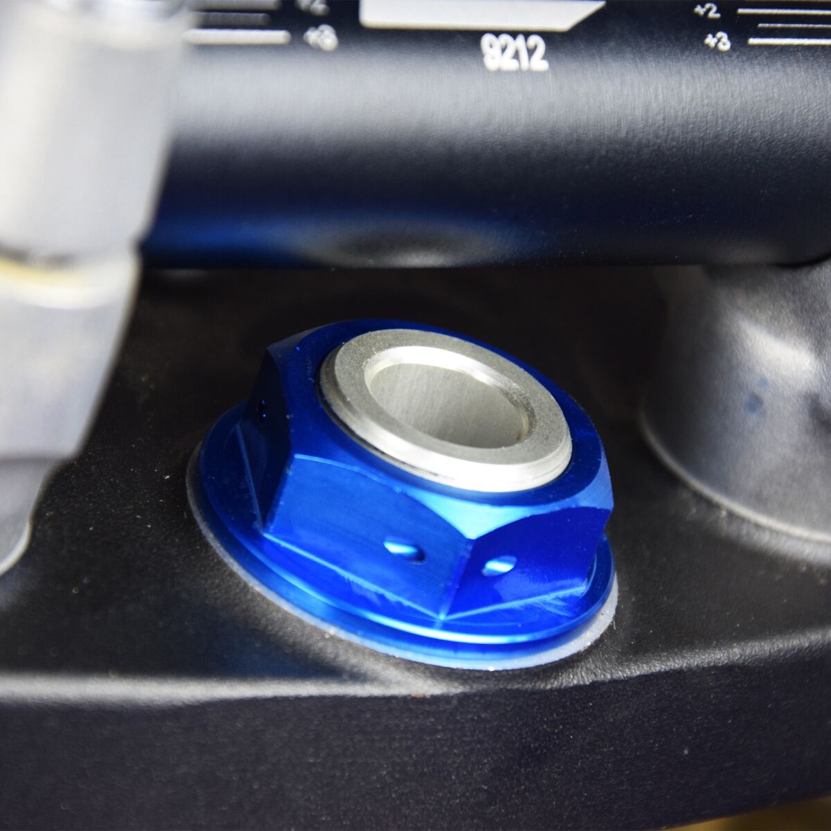 STEERING STEM NUT BL